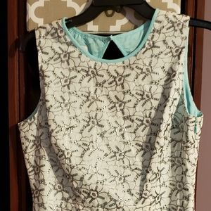 Size 8, Sleeveless dress. White w/ silver flowers